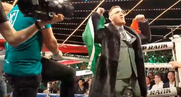 [Video] McGregor walks out & celebrates in ring with Michael Conlan